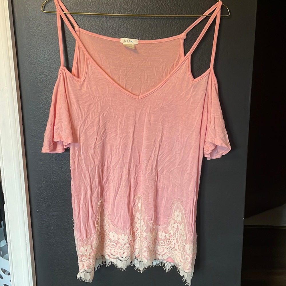 Pink top with cutout shoulders and lace bottom